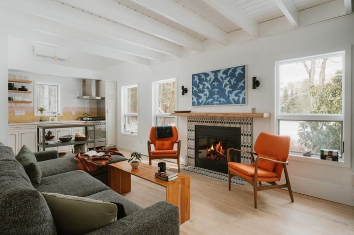 A vibrant Airbnb listing showcasing a cozy, modern apartment with city views, highlighting travel and accommodation options.